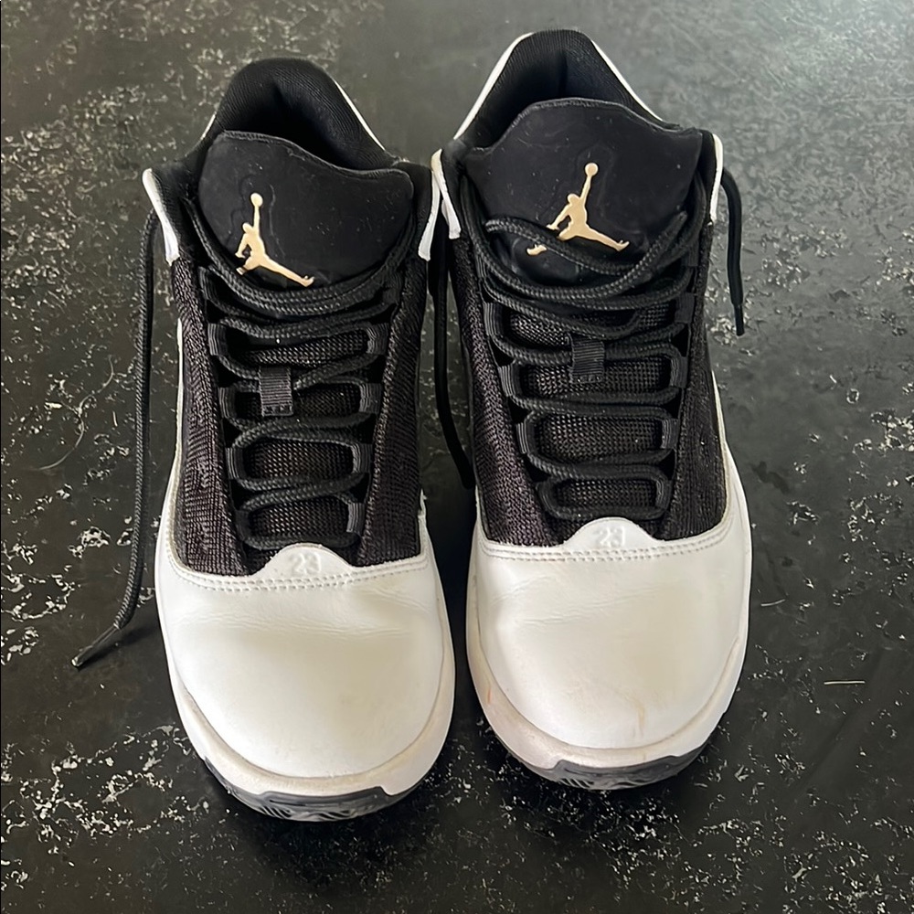 Jordan Black and White Athletic Shoes with Iconic Jumpman Logo